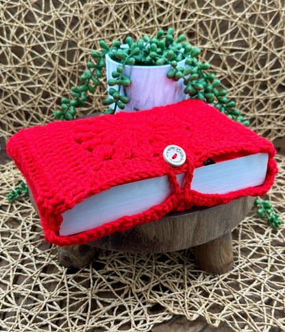 Book Sleeve Soft Crochet in Red Yarn Featuring a Classic Floral Granny Square Design  Secure Wood Button Closure, Measures about 9X6"