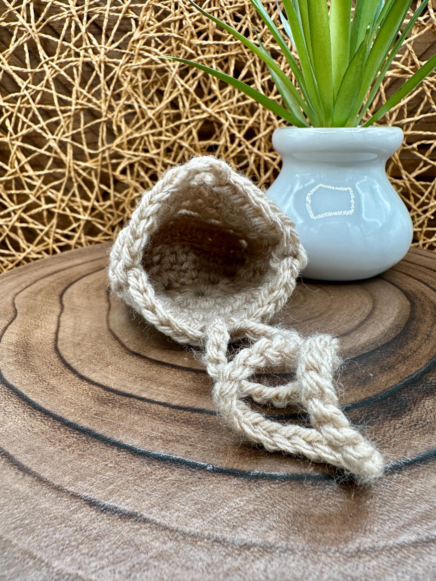 Beige Crocheted Wireless earbud case, compatible with AirPods, measures 3 T 3 H .25 D, Granny Square Design