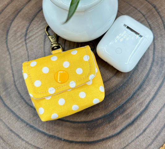 Wireless earbud case, Sunny Yellow with White Polka Dot Fabric with snap closure and swivel clasp for protection and convenience, 3X3X.75"
