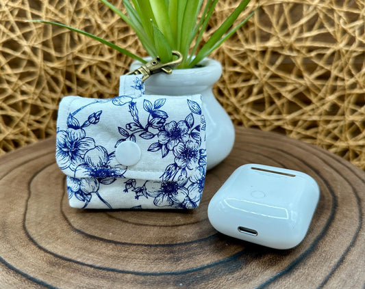 Wireless earbud case, Elegant Navy Floral fabric with snap closure and swivel clasp for added protection and convenience, 3X3X.75"
