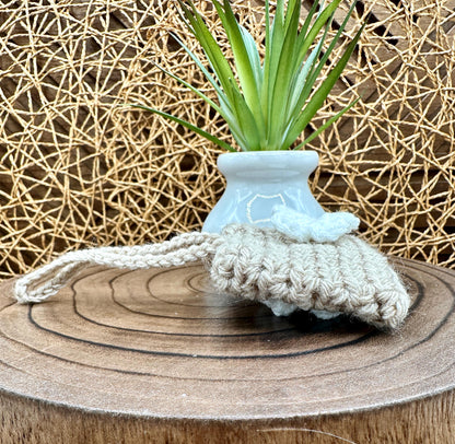 Beige Crocheted Wireless earbud case, compatible with AirPods, measures 3.25 W 2.75 H .5 D