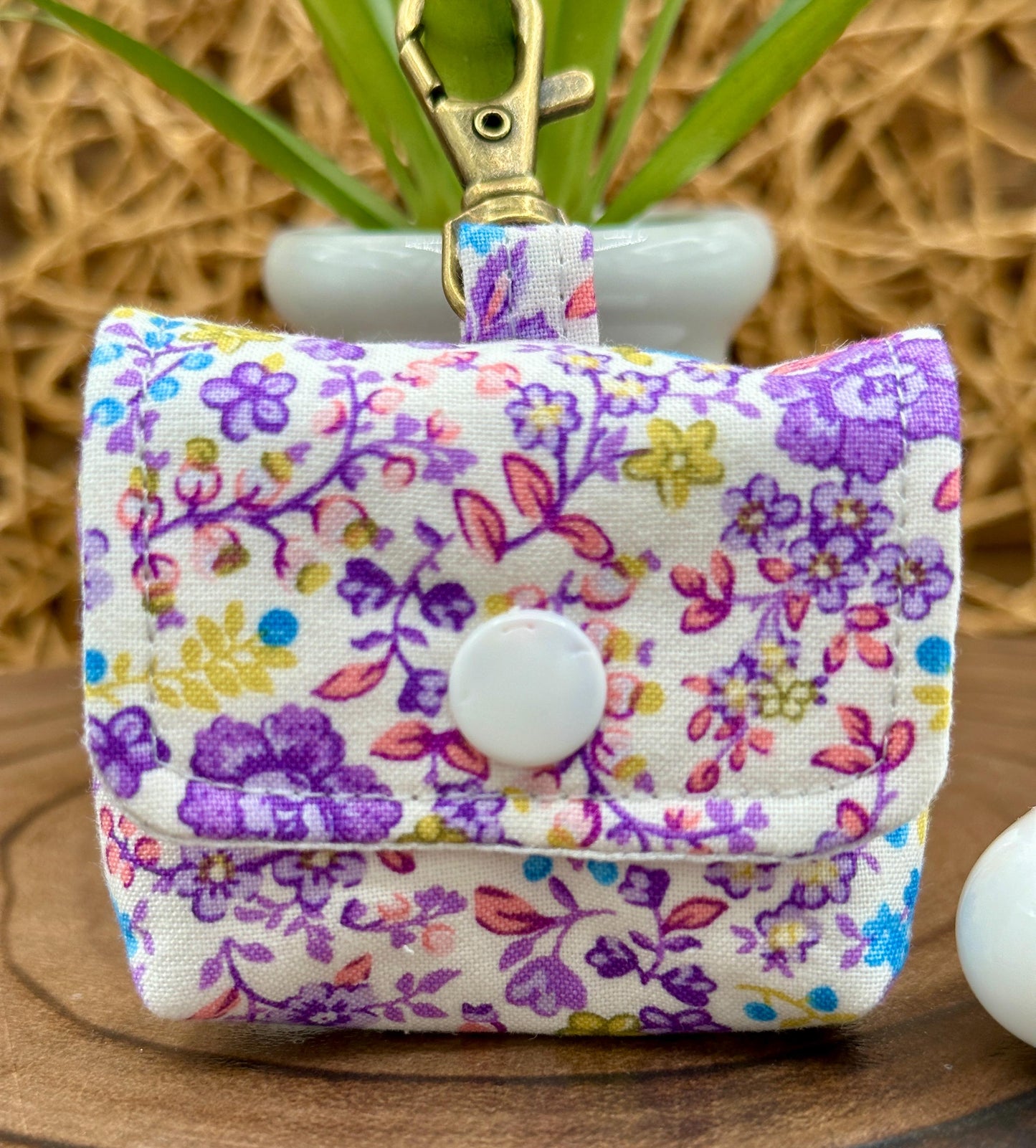 Wireless earbud case, Cute Purple and Yellow floral fabric with snap closure and swivel clasp for added protection and convenience, 3X3X.75"