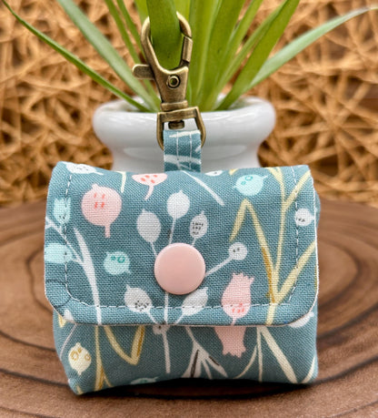 Wireless earbud case, Boho Green Floral fabric with snap closure and swivel clasp for protection and convenience, 3X3X.75"