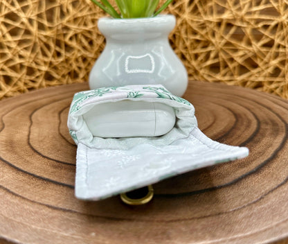 Wireless earbud case, Elegant Green Floral fabric with snap closure and swivel clasp for protection and convenience, 3X3X.75"