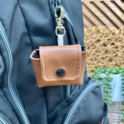 Brown Faux Leather Wireless earbud case, compatible with AirPods, snap closure swivel clasp included for easy and secure carry, 3X3X.75"