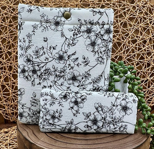 black floral kindle paperwhite sleeve and eyeglass set