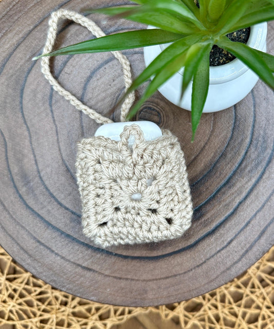 Beige Crocheted Wireless earbud case, compatible with AirPods, measures 3 T 3 H .25 D, Granny Square Design