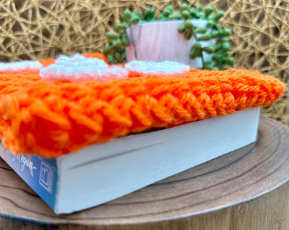 Flower Power Book Sleeve, Soft Crochet in Orange Yarn with White Flowers, Secure Wood Button Closure Measures about 8.5 X6.5"