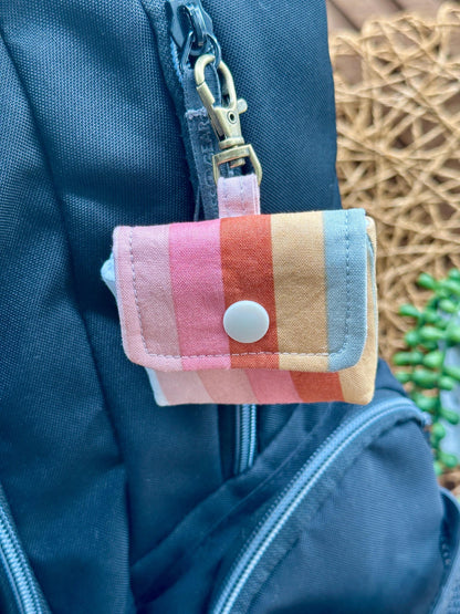 Wireless earbud case, pastel striped fabric with snap closure and swivel clasp for added protection and convenience, 3X3X.75"