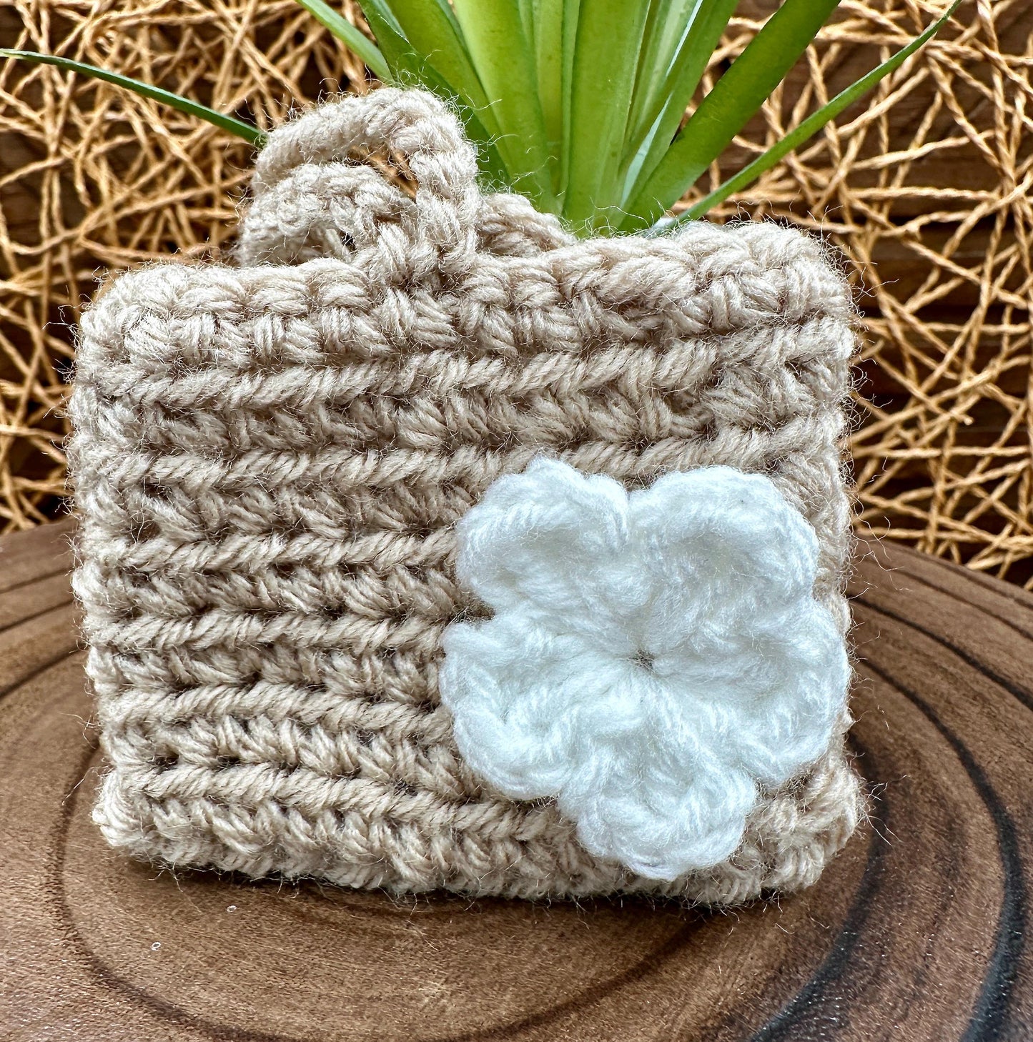 Beige Crocheted Wireless earbud case, compatible with AirPods, measures 3.25 W 2.75 H .5 D