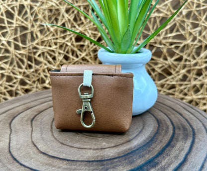 Brown Faux Leather Wireless earbud case, compatible with AirPods, snap closure swivel clasp included for easy and secure carry, 3X3X.75"