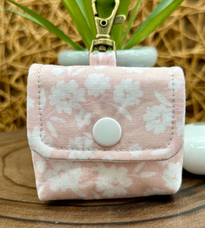 Wireless earbud case, Elegant Pink with Cream Flowers Fabric with Snap Closure and Swivel Clasp for Style and Convenience, 3X3X.75"