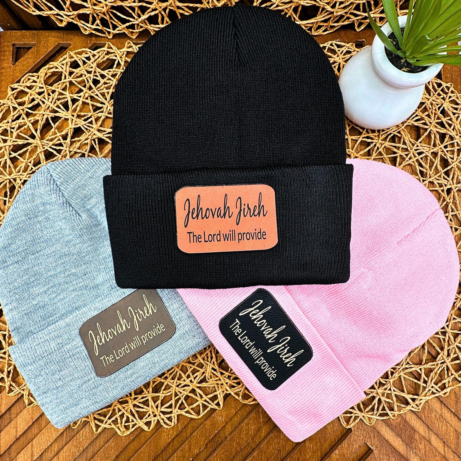 Stay warm and stylish with this faith inspired beanie featuring an engraved faux leather patch with a powerful name of God.  Perfect for Christian gifts and everyday wear.