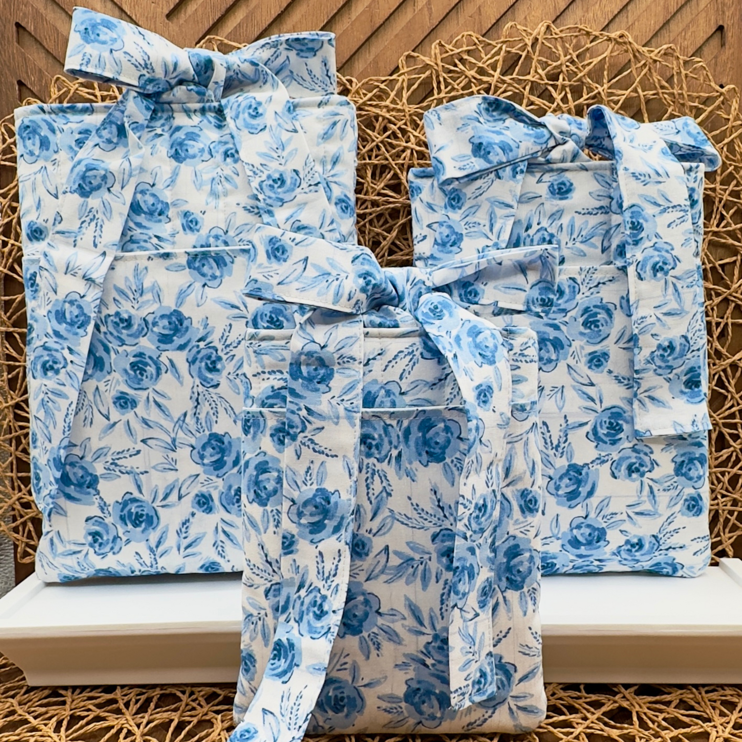 blue floral book sleeves in three sizes, small, medium and large