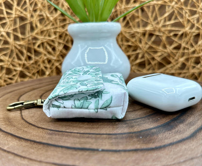 Wireless earbud case, Elegant Green Floral fabric with snap closure and swivel clasp for protection and convenience, 3X3X.75"