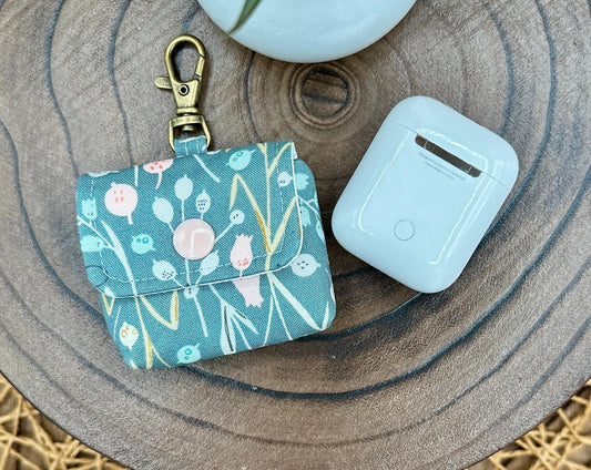 Wireless earbud case, Boho Green Floral fabric with snap closure and swivel clasp for protection and convenience, 3X3X.75"