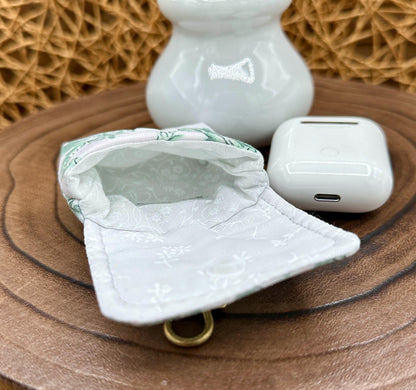 Wireless earbud case, Elegant Green Floral fabric with snap closure and swivel clasp for protection and convenience, 3X3X.75"