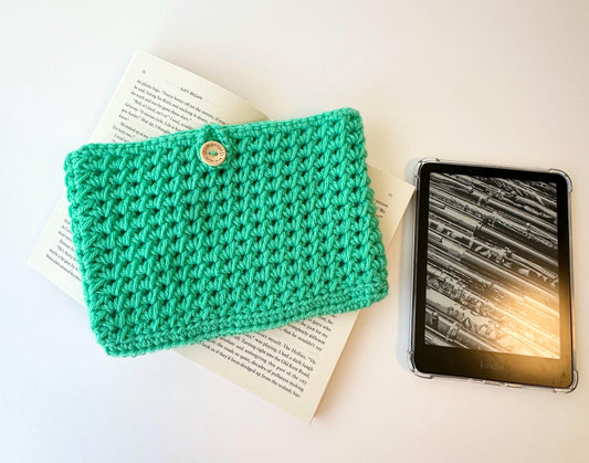 green crocheted book sleeve