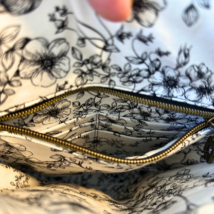Black Floral Faux Leather Crossbody Bag with Adjustable Strap and Magnetic Snap Closure