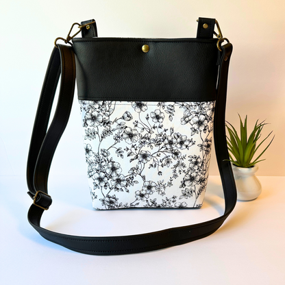 Black Floral Faux Leather Crossbody Bag with Adjustable Strap and Magnetic Snap Closure