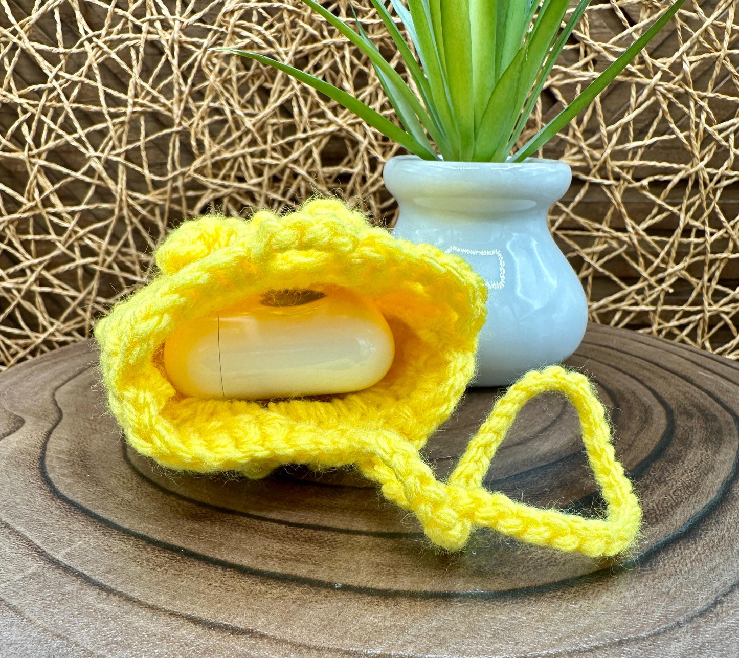 Yellow Crocheted Wireless earbud case, compatible with AirPods, measures 3 T 3 H .25 D, Pretty Raised Flower Granny Square Design