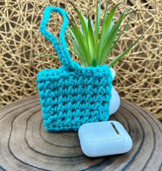 Blue Crocheted Wireless earbud case, compatible with AirPods, measures 3 T 3 H .25 D, Pretty Crochet Stitch Design