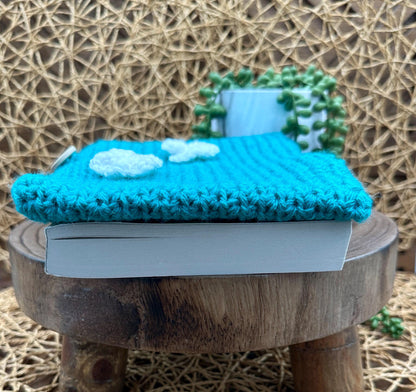 Flower Power Book Sleeve, Soft Crochet in Teal Blue Yarn with White Flowers, Secure Wood Button Closure Measures about 9X6"